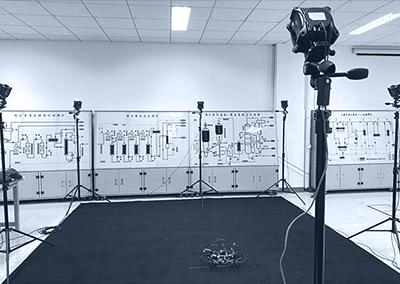 The motion capture system captures the pose data of the quadrotor robot through markers